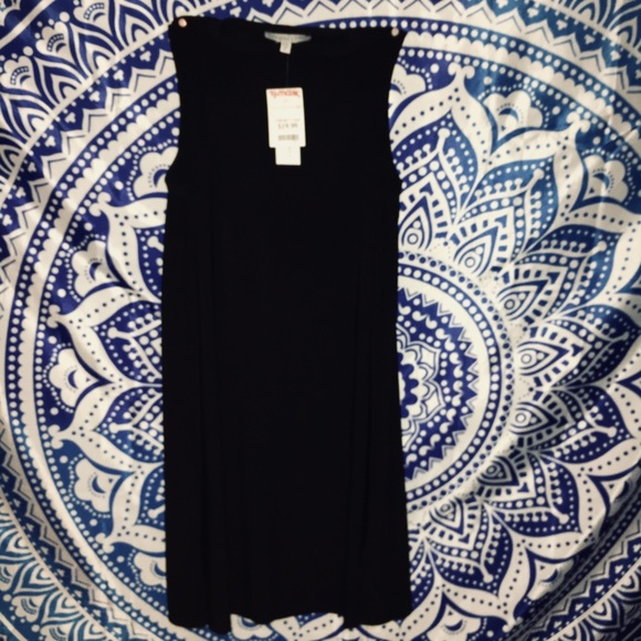Dresses & Skirts - A small black knee length dress.